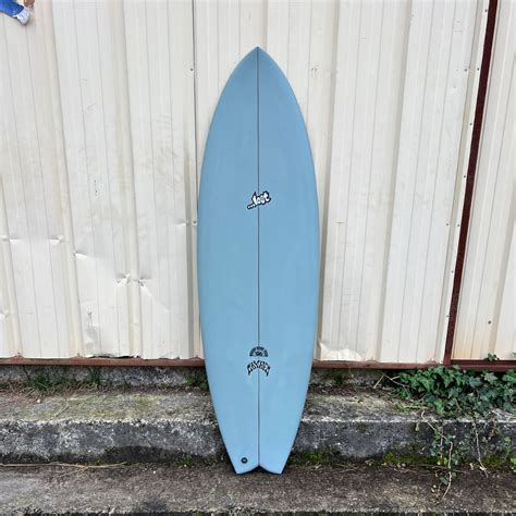 Generous dims, low rocker, flat deck, steep rails and wide tail, made catching waves and speeding along, easier than any fish wed ever designed. . Lost round nose fish 96